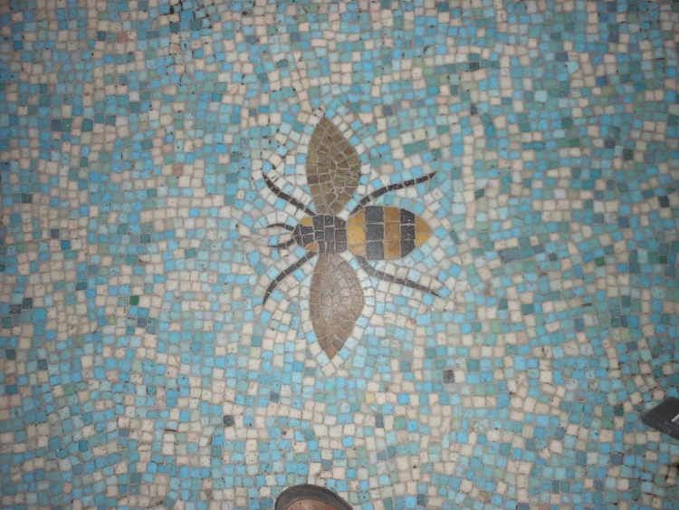 Floor tile in the main hall:the bee is Battersea's symbol