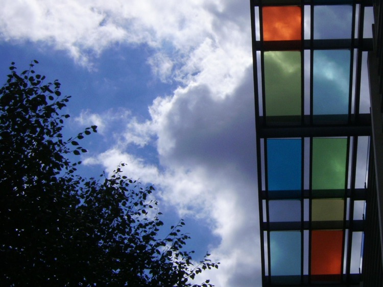Huge unbreakable glass ceiling panels; sunny day.