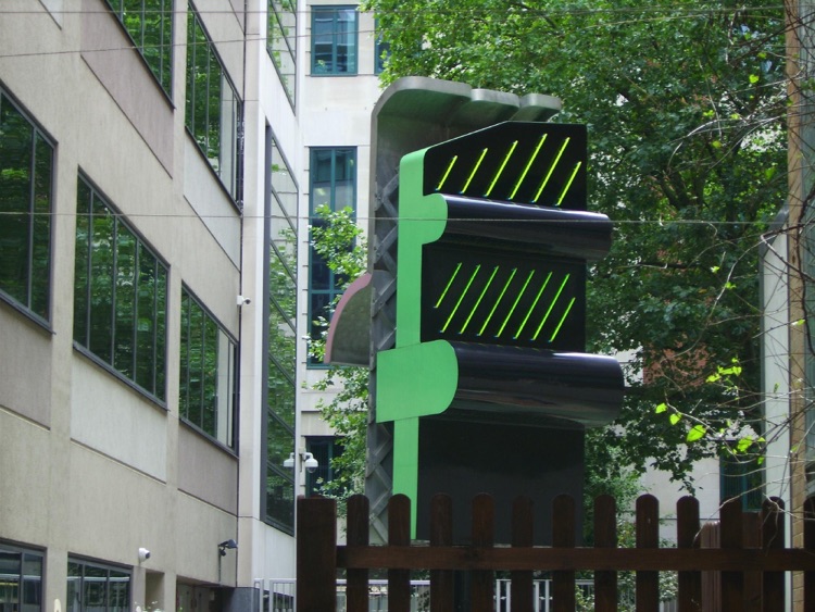 Garden Sculpture; revolves clockwise, showing green NEON.