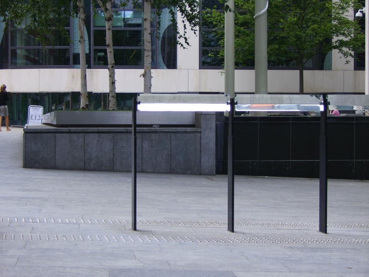 One single prisim, showing white, Home Office Building Sculpture.