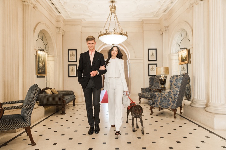 Couple with dog in The Lanesborough's lobby