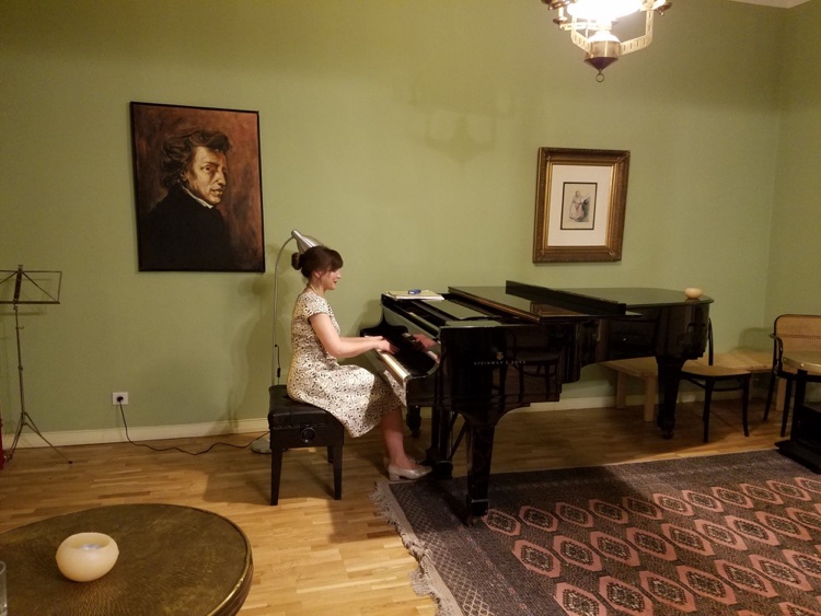 Pianist playing Chopin at Chopin Salon