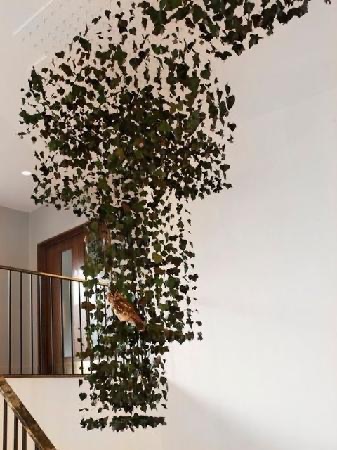 Owl in leaves - artwork on 3rd floor stair case