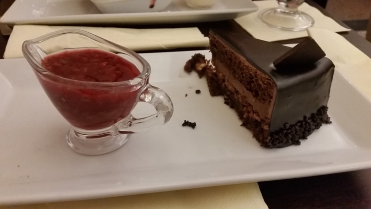 Chocolate cake with cherry sauce