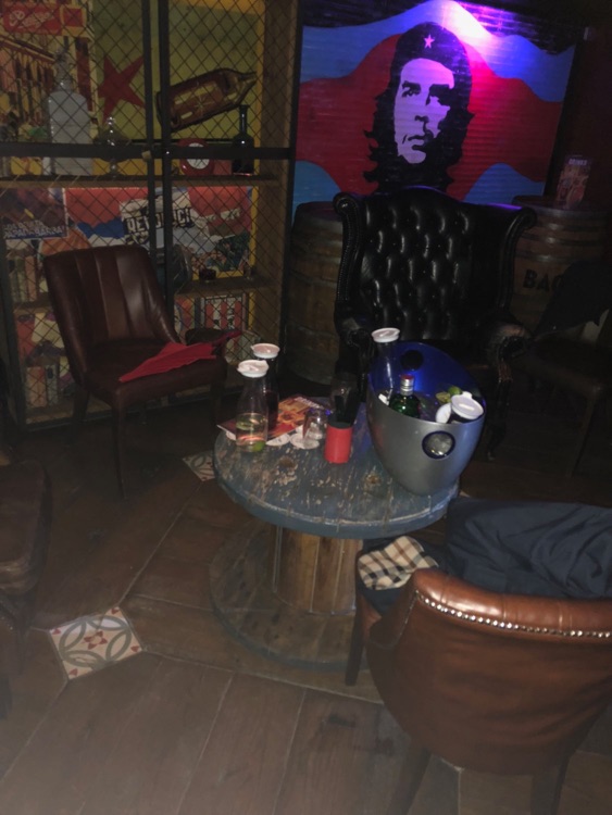 Empty tables - no one is allowed to sit.