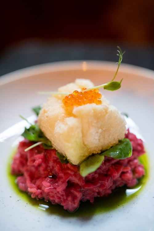 Codfish with beetroot risotto and rocket