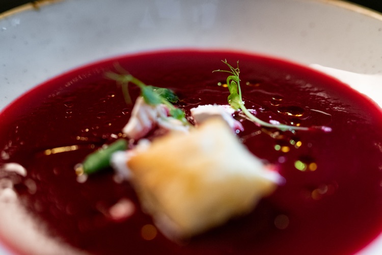 Beetroot cream soup with goat cheese and French cookie