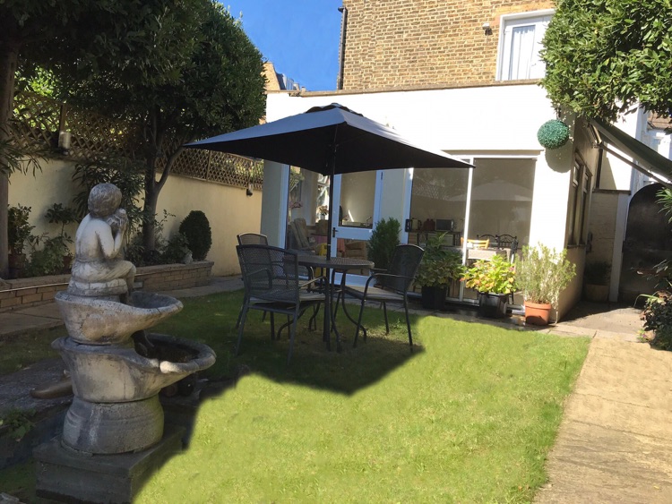 Garden and outside lounge area which has a microwave,toaster and kettle where you can prepare me