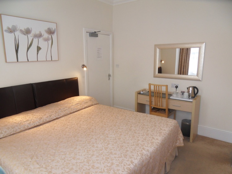 Room 5 King size with private toilet. Shower is outside the room but not shared with other guest