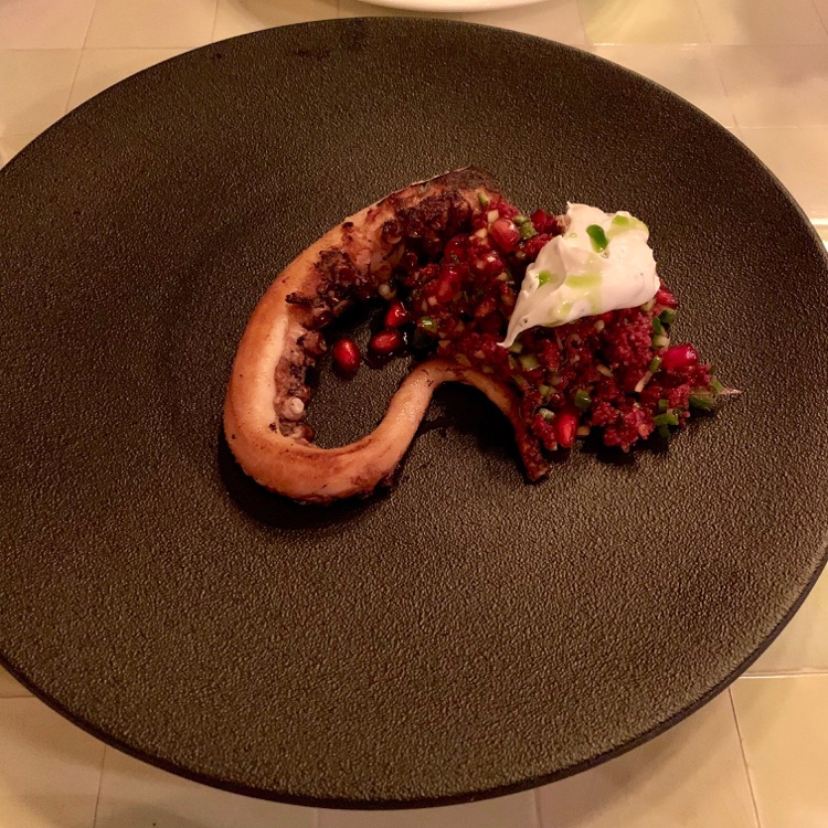 Octopus, bulghur, isot, pomegranate, sour cherry, labneh