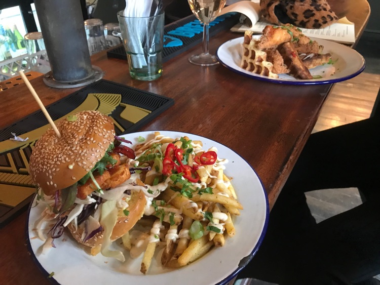 Jerk Halloumi Bun w/ Chicken and Waffles in the background, was peng.