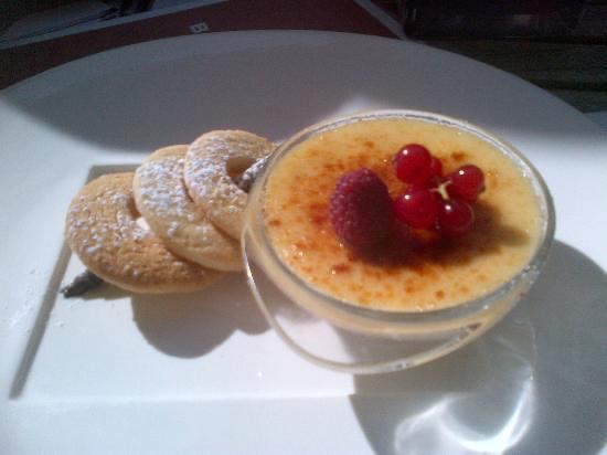 Passion fruit creme brulee with white chocolate shortbread.