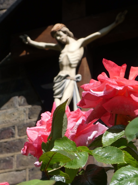 The Church of Saint Mary the Virgn, Rotherhithe: crucifix on church exterior