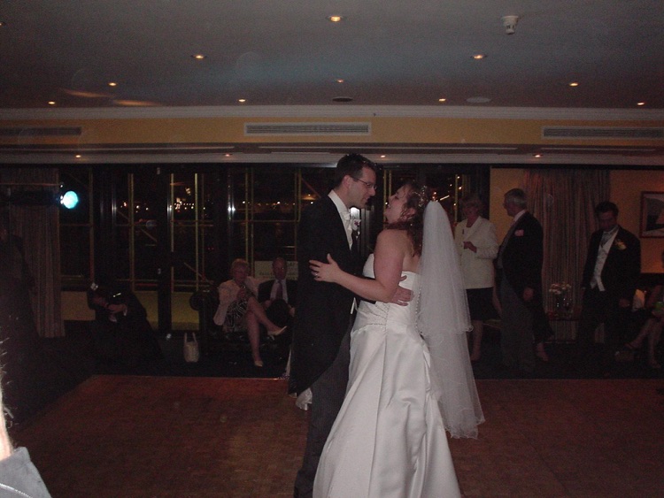 Bride and groom take the floor for the first dance