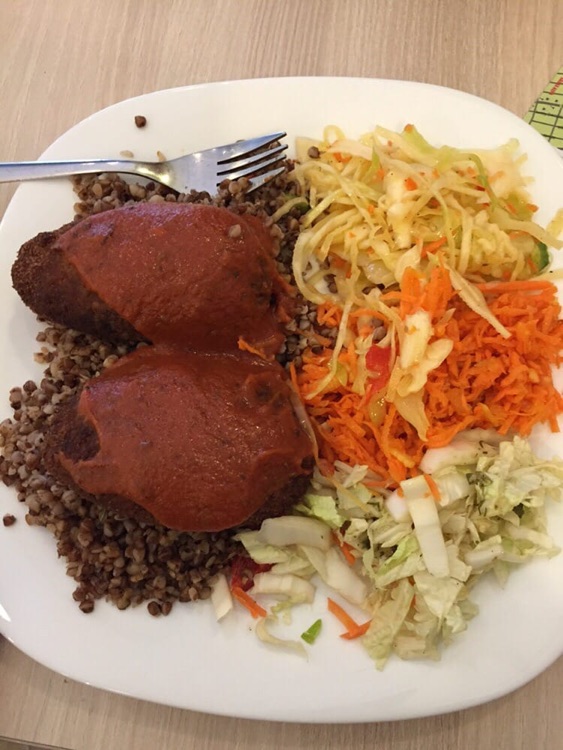 Soya burger with groats, tomato sauce, salad