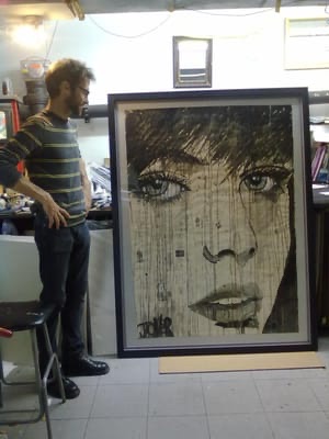 The maestro surveys his work, the frame not the artwork but it looks great!