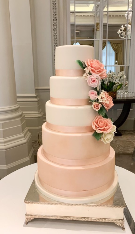 5 tier wedding cake in soft blush colours and sugar flowers